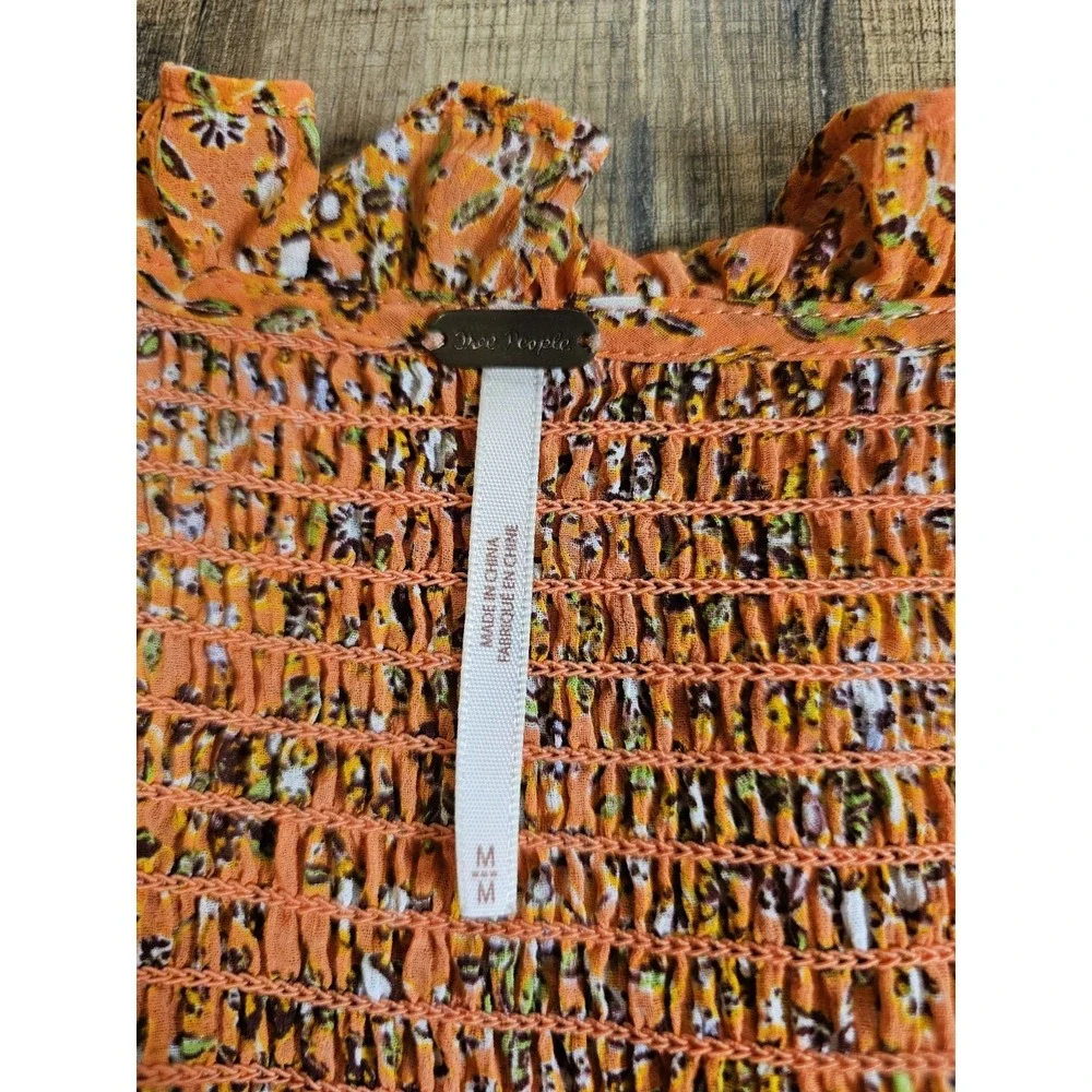Free People Lela Smocked Ruffle Floral Blouse M Coral Boho Hippie Lightweight